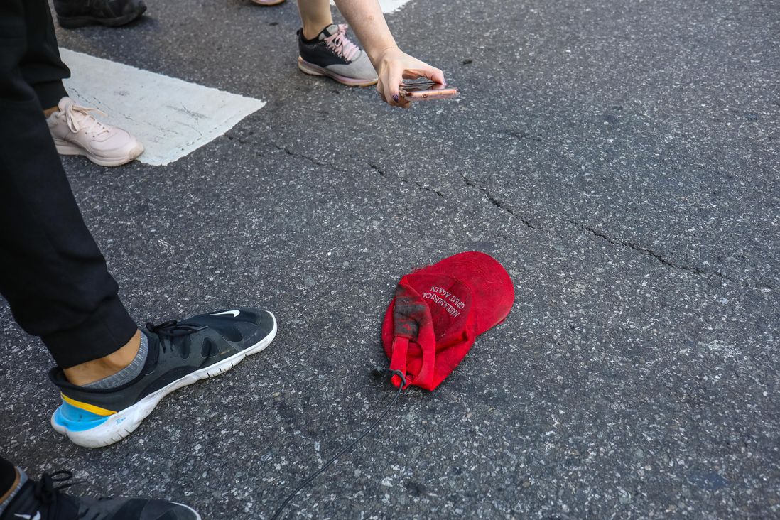 A dirty MAGA hat on the ground
